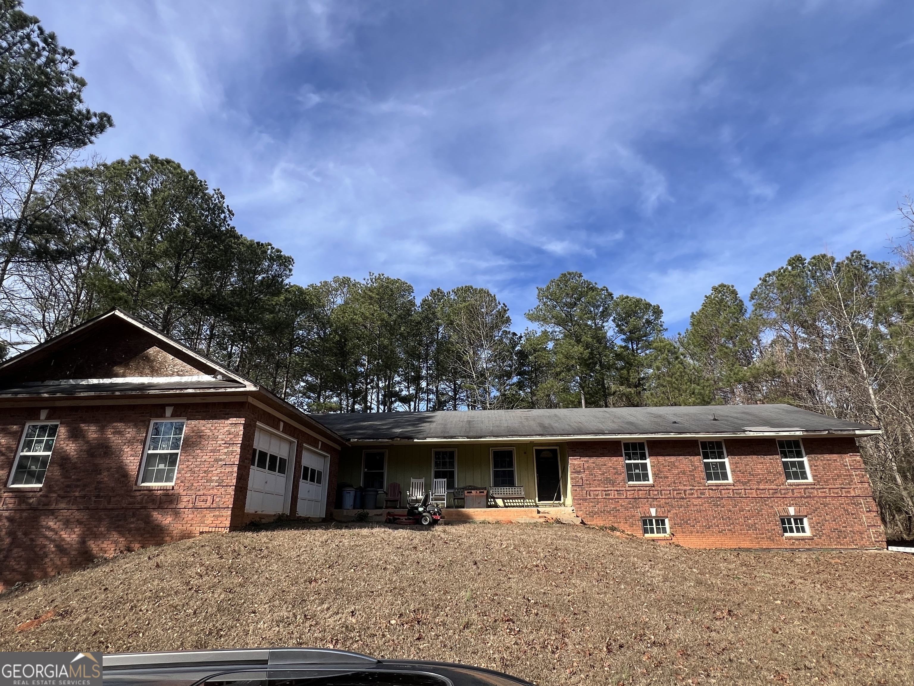 2282 Fairburn Road Douglasville, GA 30135 - Photo 1 of 14 a front view of a house with a yard