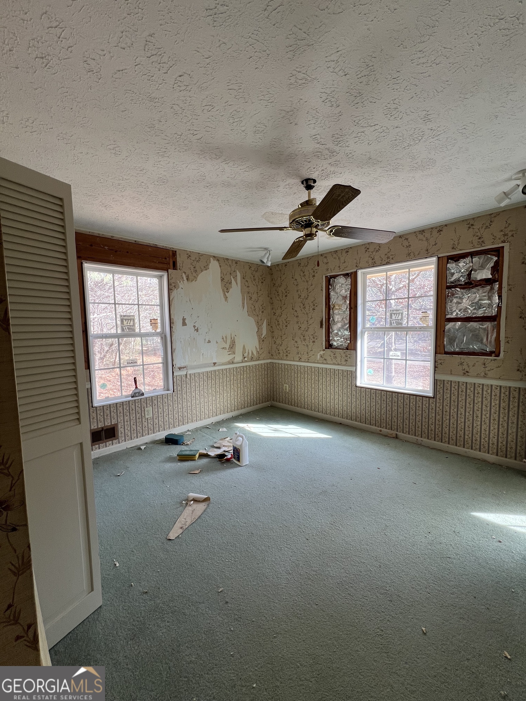 2282 Fairburn Road Douglasville, GA 30135 - Photo 11 of 14 a view of empty room with windows