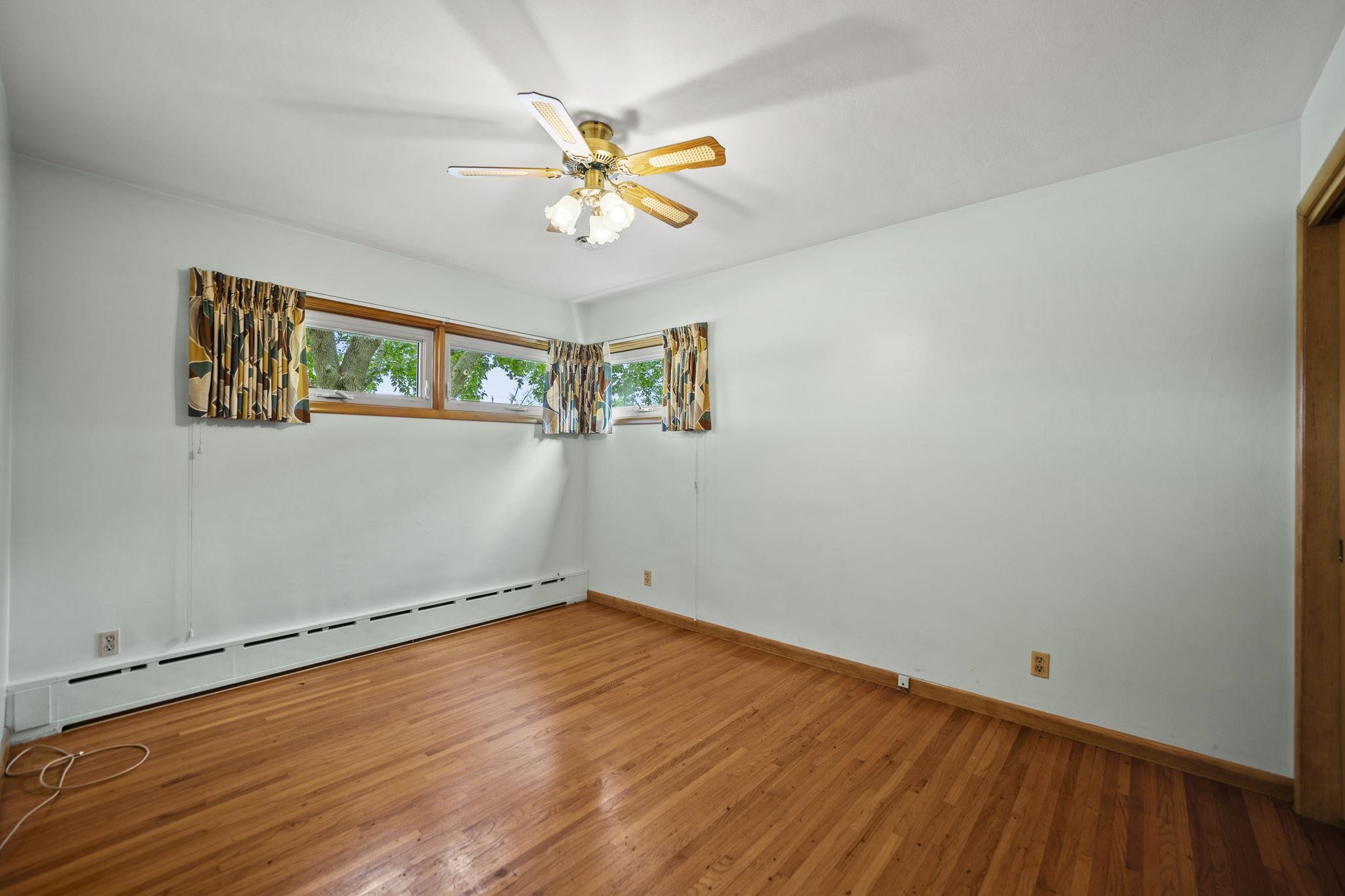 1205 7th Avenue Belvidere, IL 61008 - Photo 11 of 33 a view of empty room with wooden floor