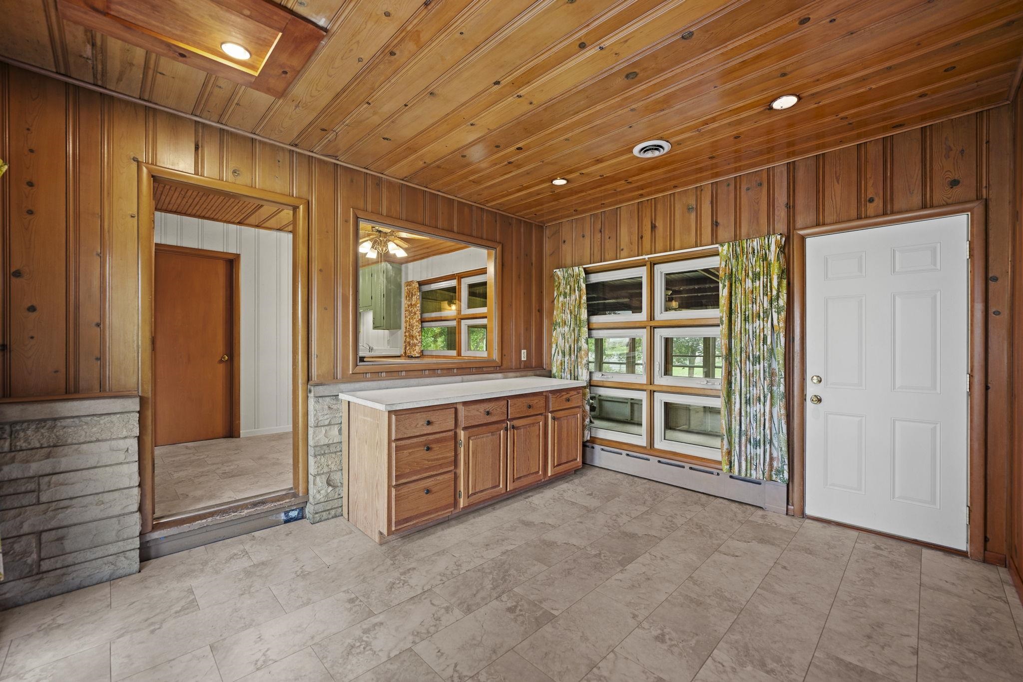 1205 7th Avenue Belvidere, IL 61008 - Photo 16 of 33 a spacious en suite bathroom with a large tub and shower