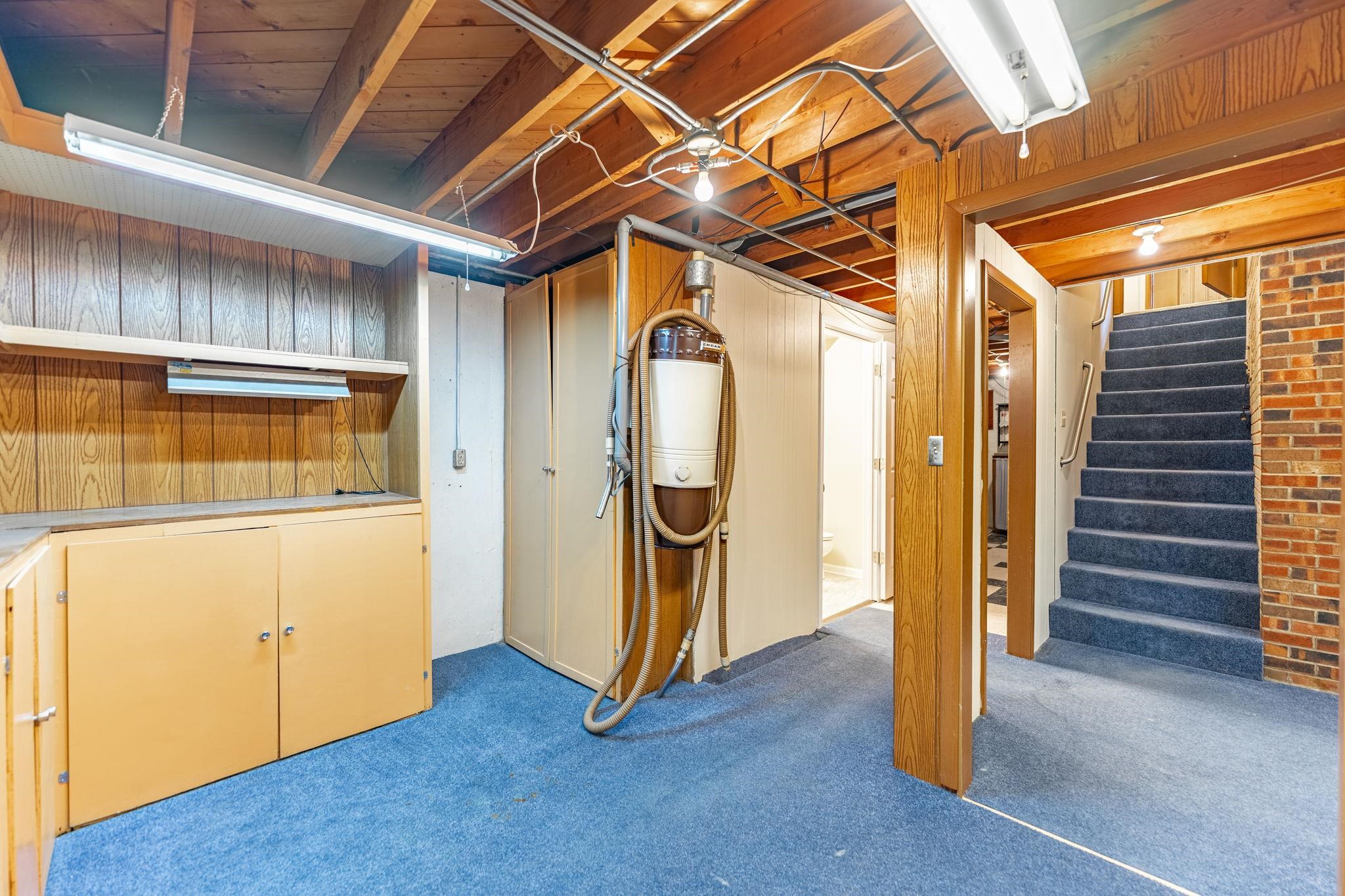 1205 7th Avenue Belvidere, IL 61008 - Photo 26 of 33 a view of an empty room with wooden floor and windows