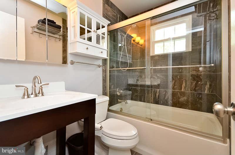 6932 Conservation Drive Springfield, VA 22153 - Photo 20 of 26 Hall Bath recently renovated