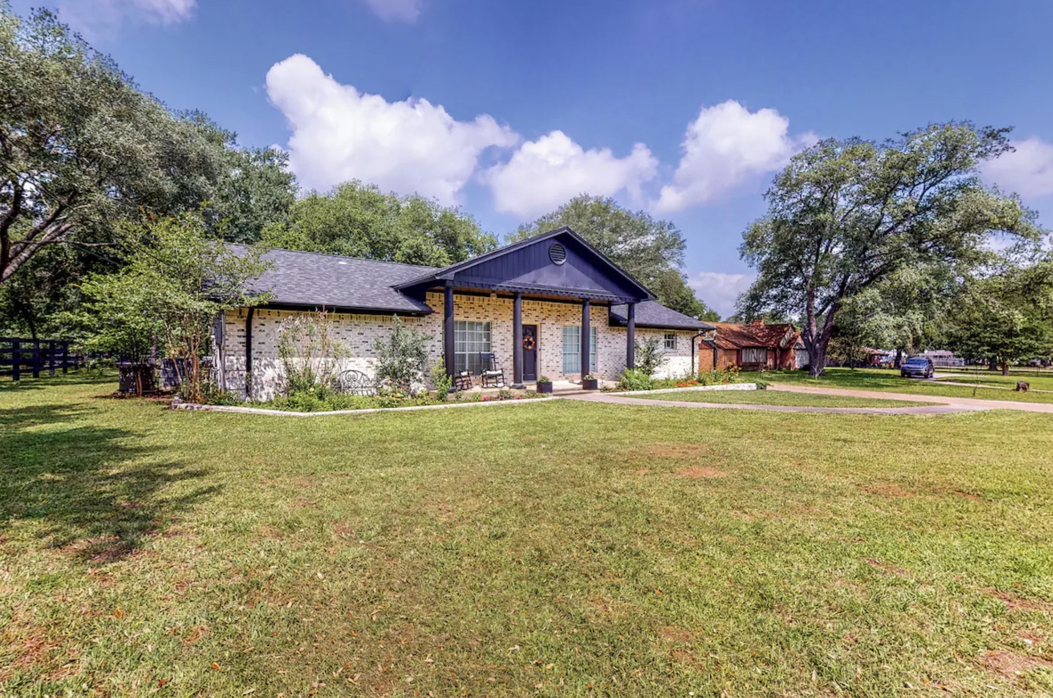 30819 Quinn Road Tomball, TX 77375 - Photo 2 of 30 a front view of a house with a big yard