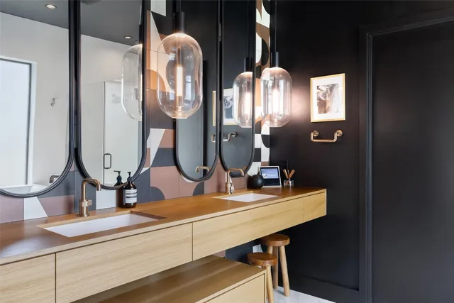 a view of a livingroom with furniture and flowers