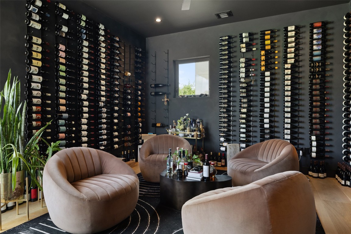 204 Westbrook Drive Austin, TX 78746 - Photo 19 of 40 a view of a livingroom with furniture and flowers