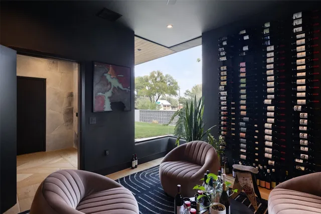 a bathroom with a sink toilet and mirror