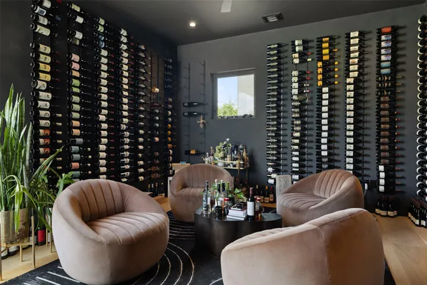 a bedroom with furniture or couch and a large window