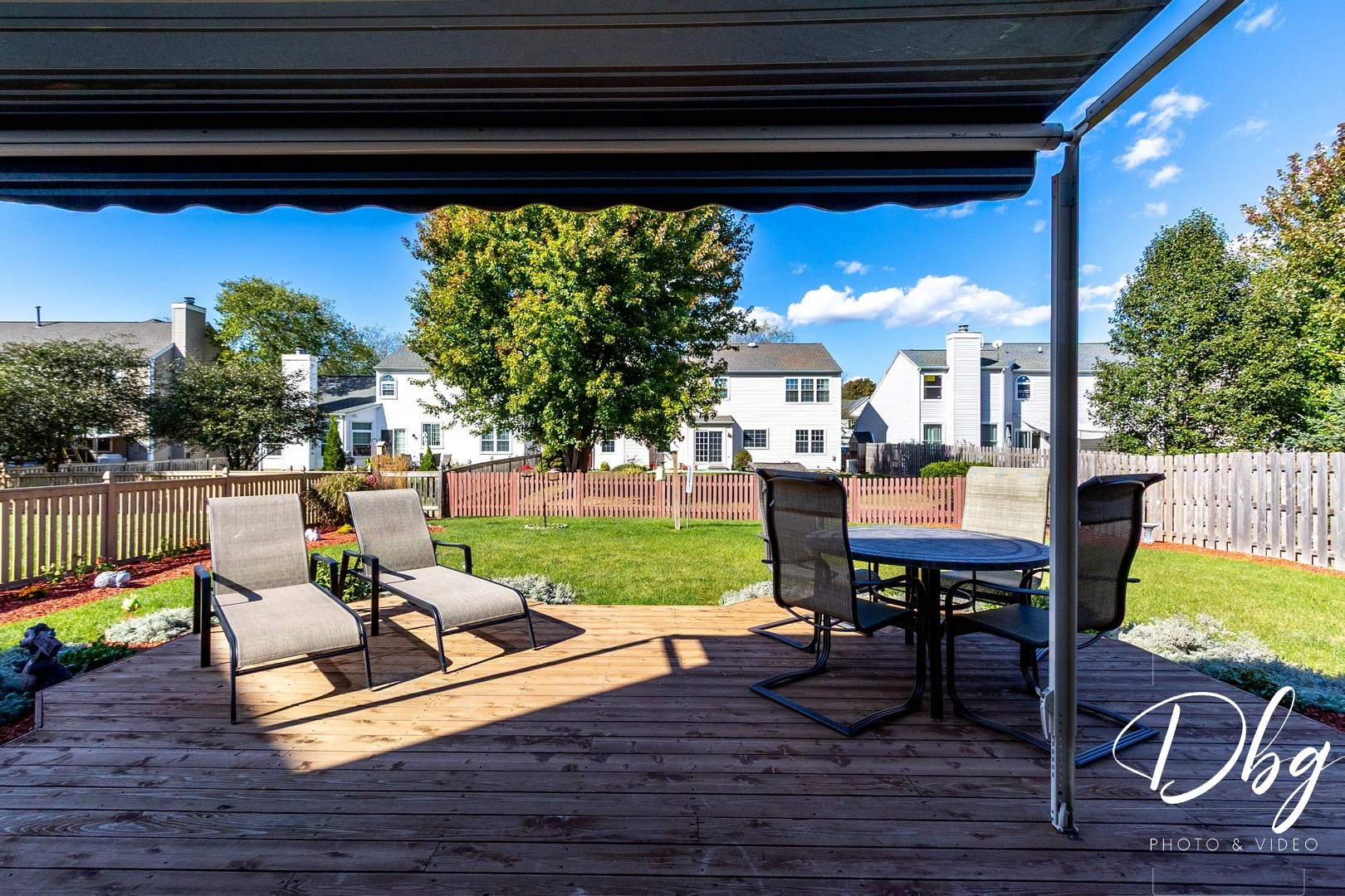 252 Carters Grove Court Grayslake, IL 60030 - Photo 42 of 69 a view of a patio with a dining table and chairs with a wooden floor