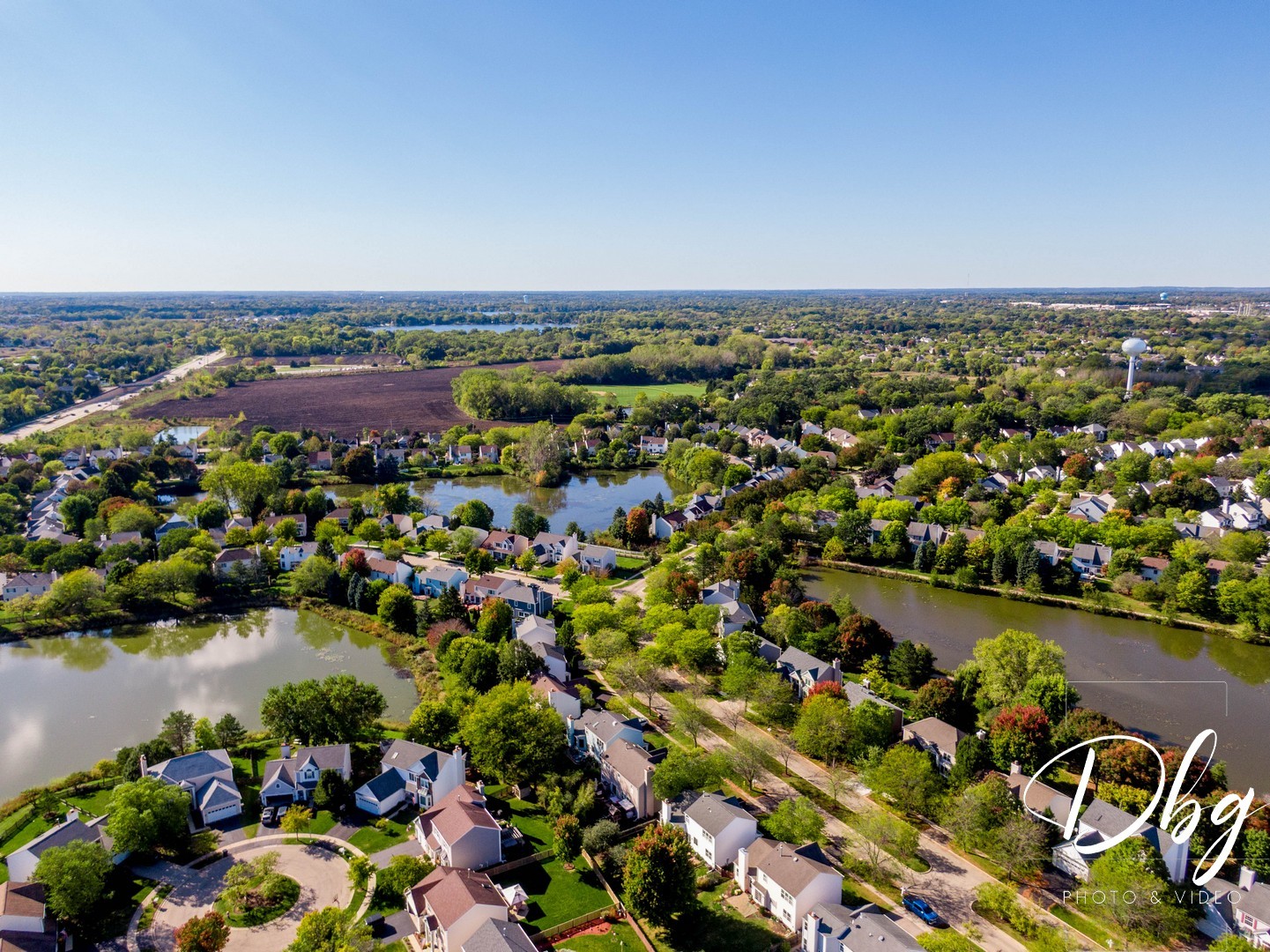 252 Carters Grove Court Grayslake, IL 60030 - Photo 53 of 69 an aerial view of a city with lots of residential buildings and lake view
