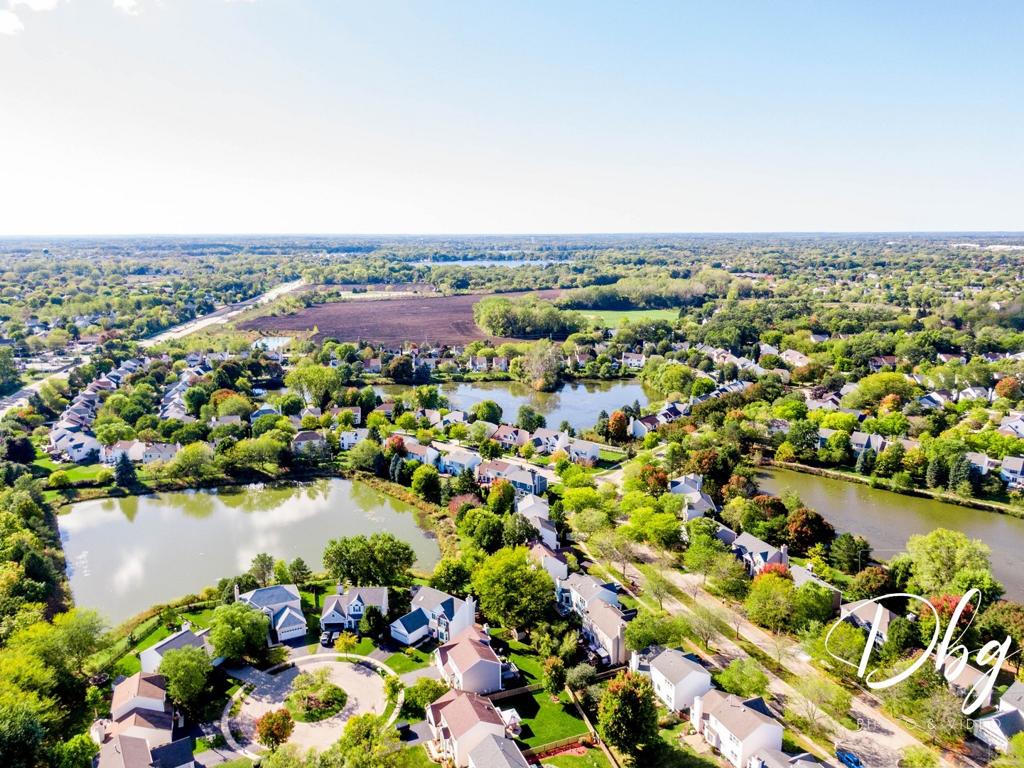 252 Carters Grove Court Grayslake, IL 60030 - Photo 56 of 69 an aerial view of lake and residential houses with outdoor space