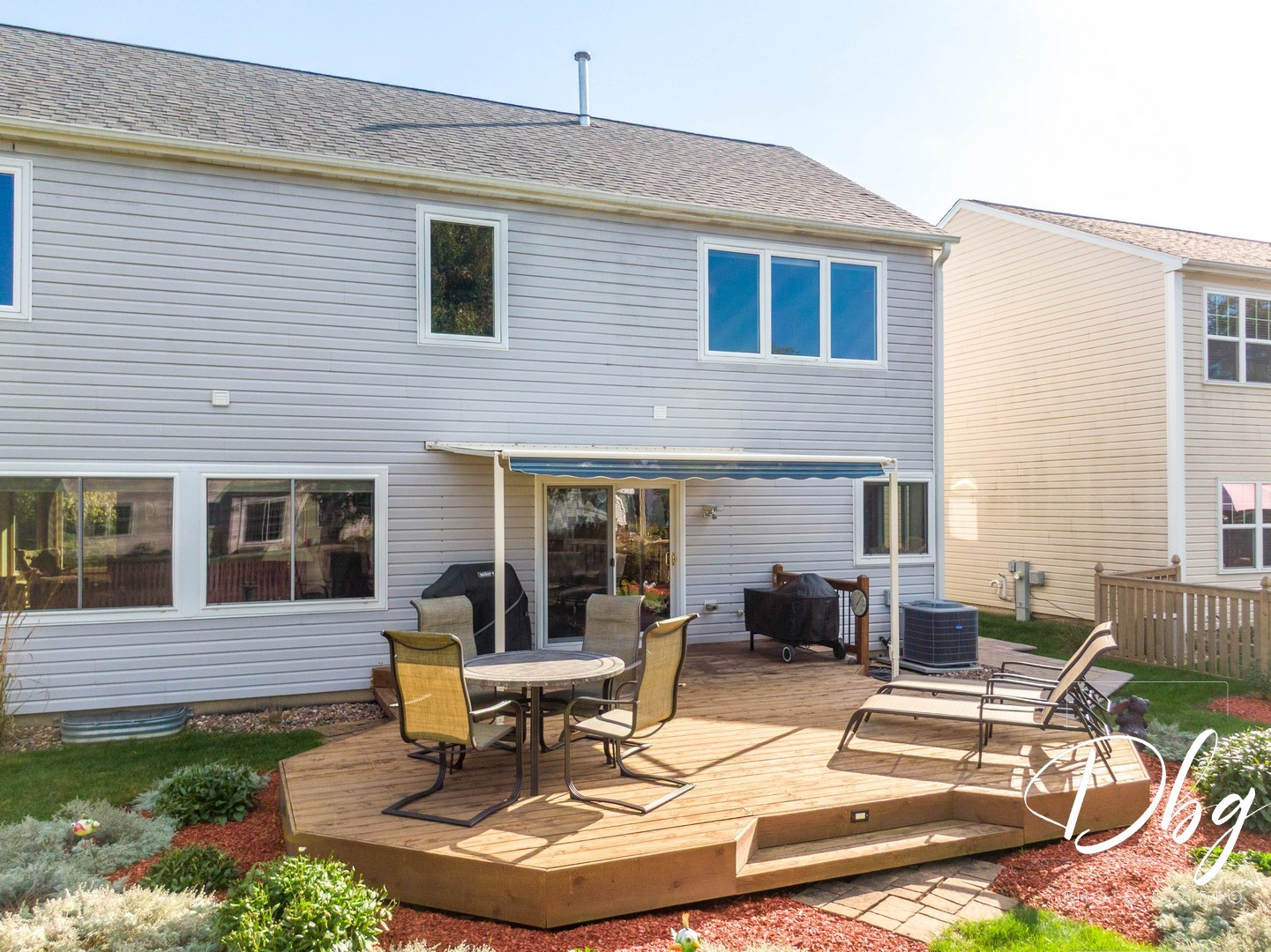 252 Carters Grove Court Grayslake, IL 60030 - Photo 63 of 69 a view of a house with backyard sitting area and swimming pool