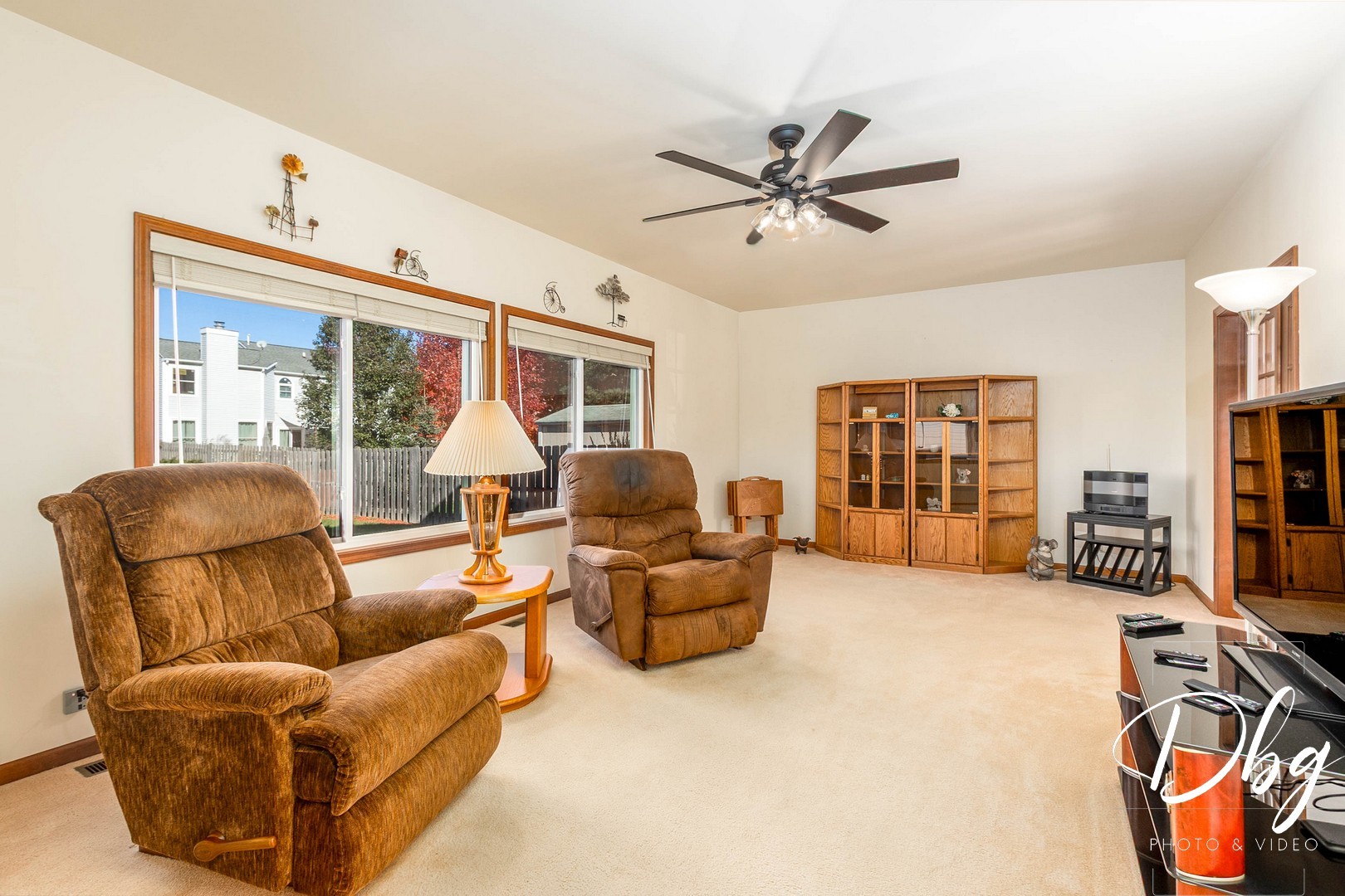 252 Carters Grove Court Grayslake, IL 60030 - Photo 10 of 69 a living room with furniture a ceiling fan and a window