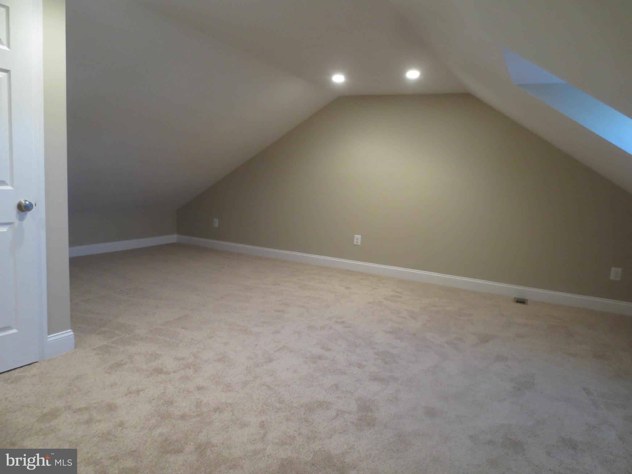 1724 Hartsdale Road Baltimore, MD 21239 - Photo 12 of 30 Large Attic Bedroom with closet