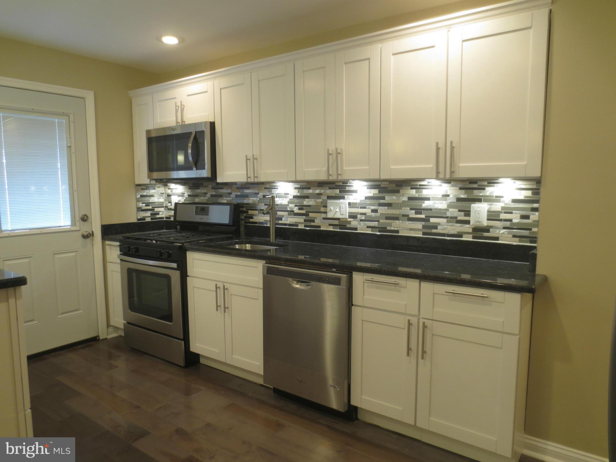 1724 Hartsdale Road Baltimore, MD 21239 - Photo 2 of 30 Gorgeous Kitchen with New White Shaker Cabinets