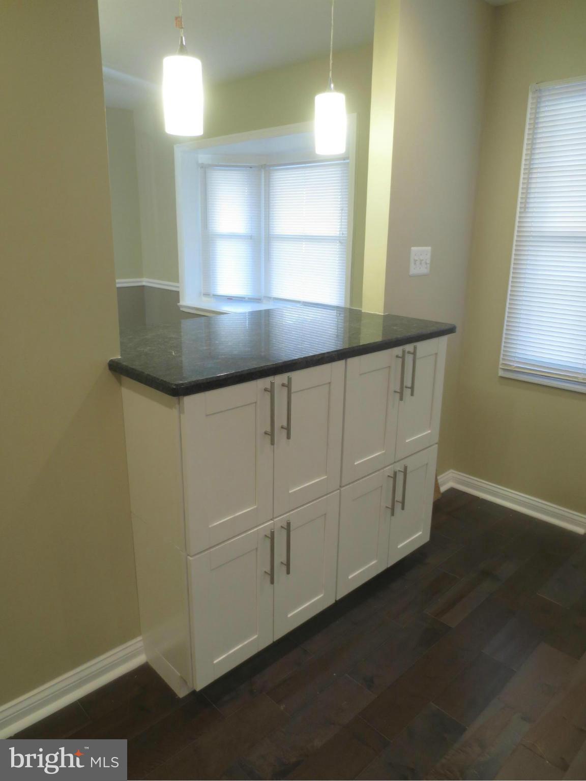 1724 Hartsdale Road Baltimore, MD 21239 - Photo 8 of 30 Granite Breakfast Bar with Cabinets