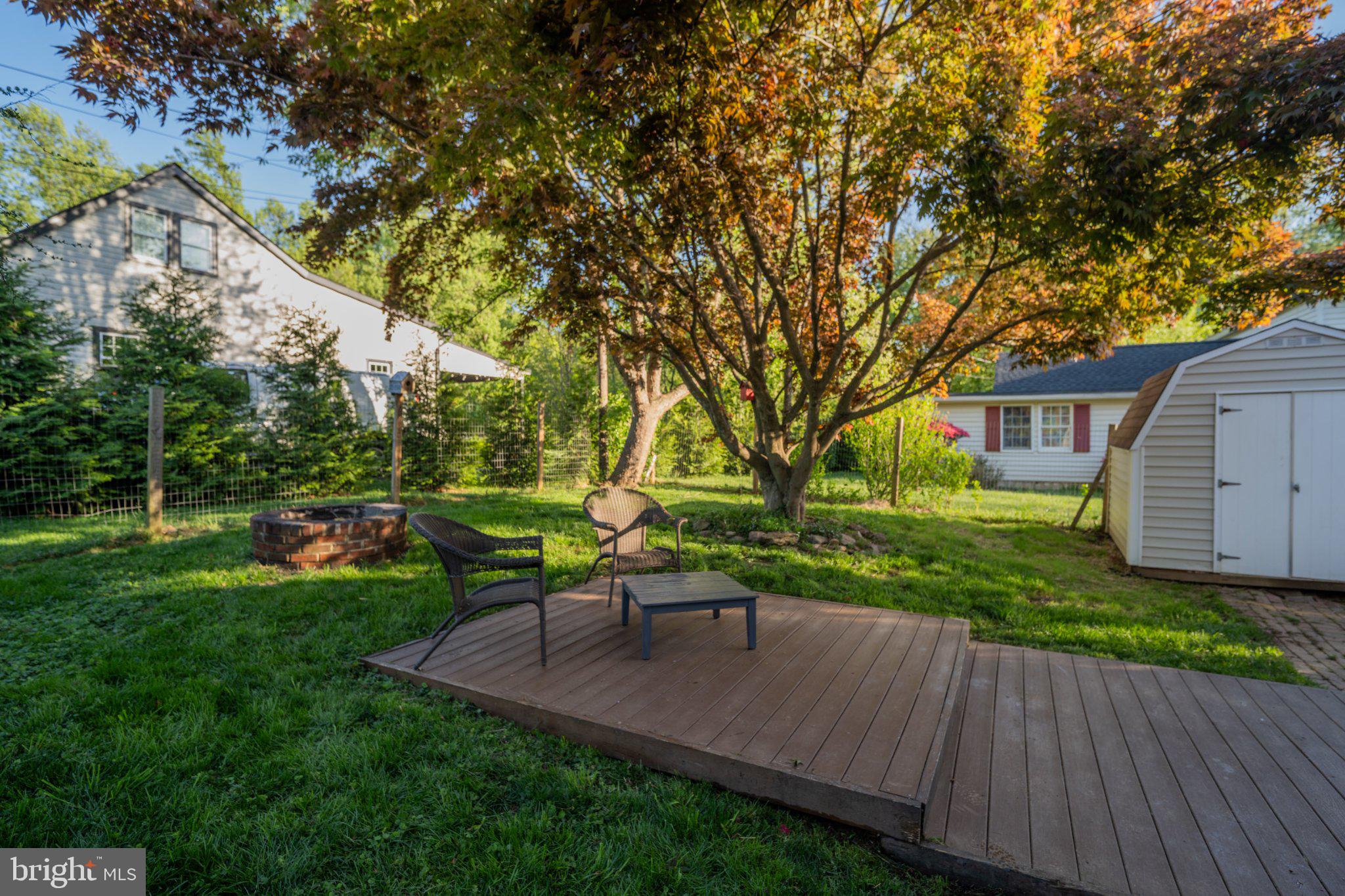 430 Pine Grove Road Bluemont, VA 20135 - Photo 14 of 58 a view of a backyard with sitting area