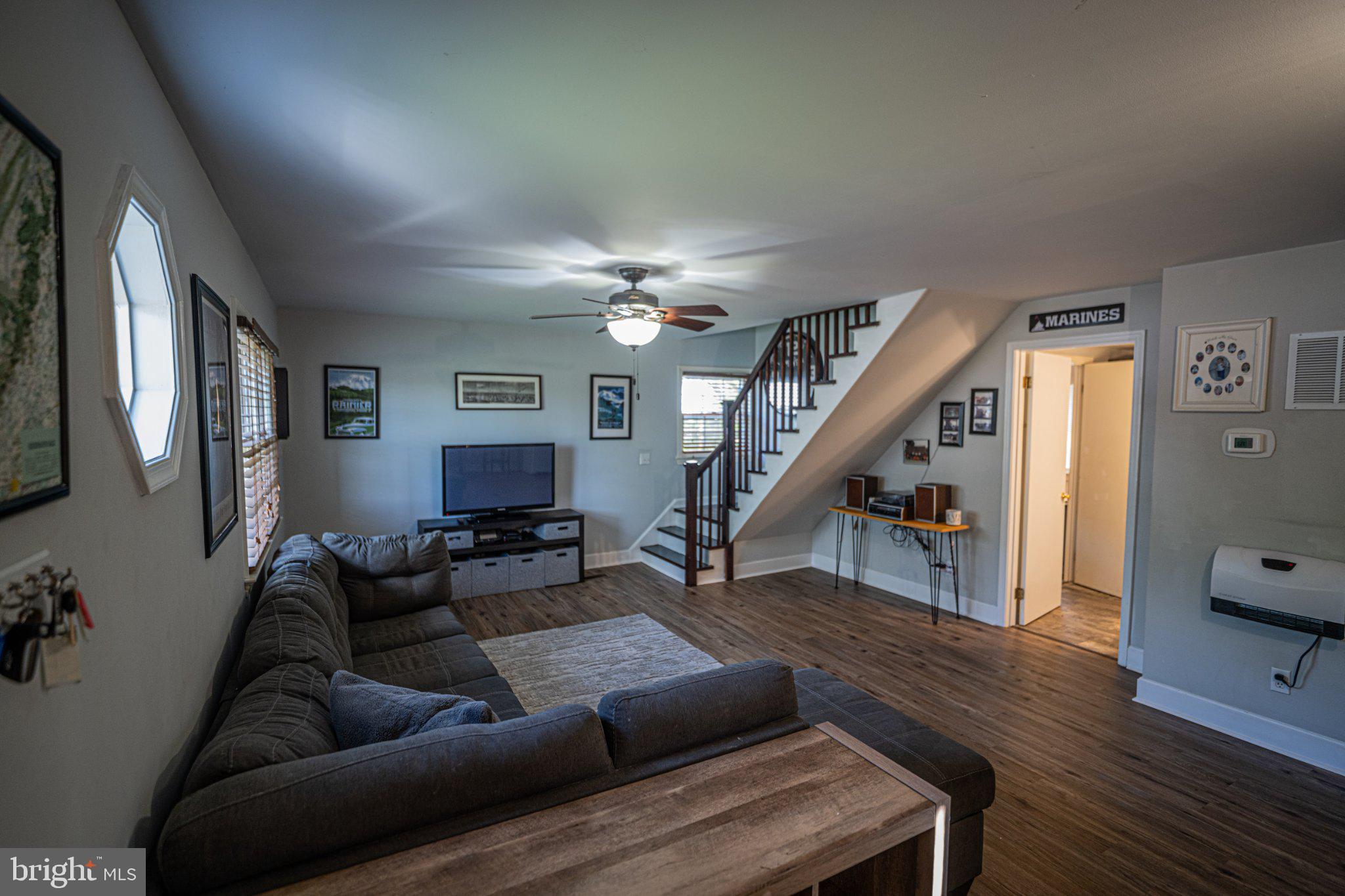 430 Pine Grove Road Bluemont, VA 20135 - Photo 32 of 58 a living room with furniture and stairs