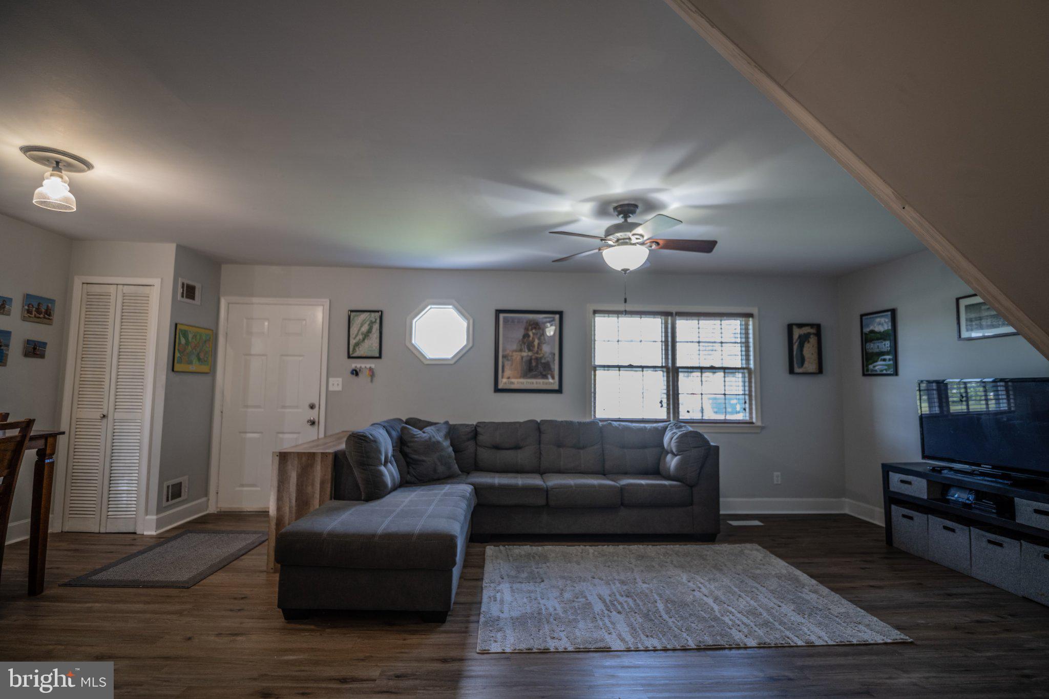 430 Pine Grove Road Bluemont, VA 20135 - Photo 33 of 58 a living room with furniture and a flat screen tv