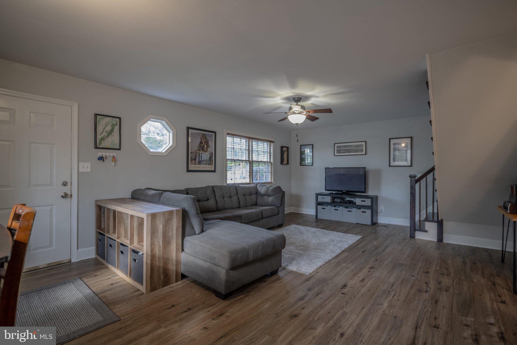 430 Pine Grove Road Bluemont, VA 20135 - Photo 36 of 58 a living room with furniture and a wooden floor