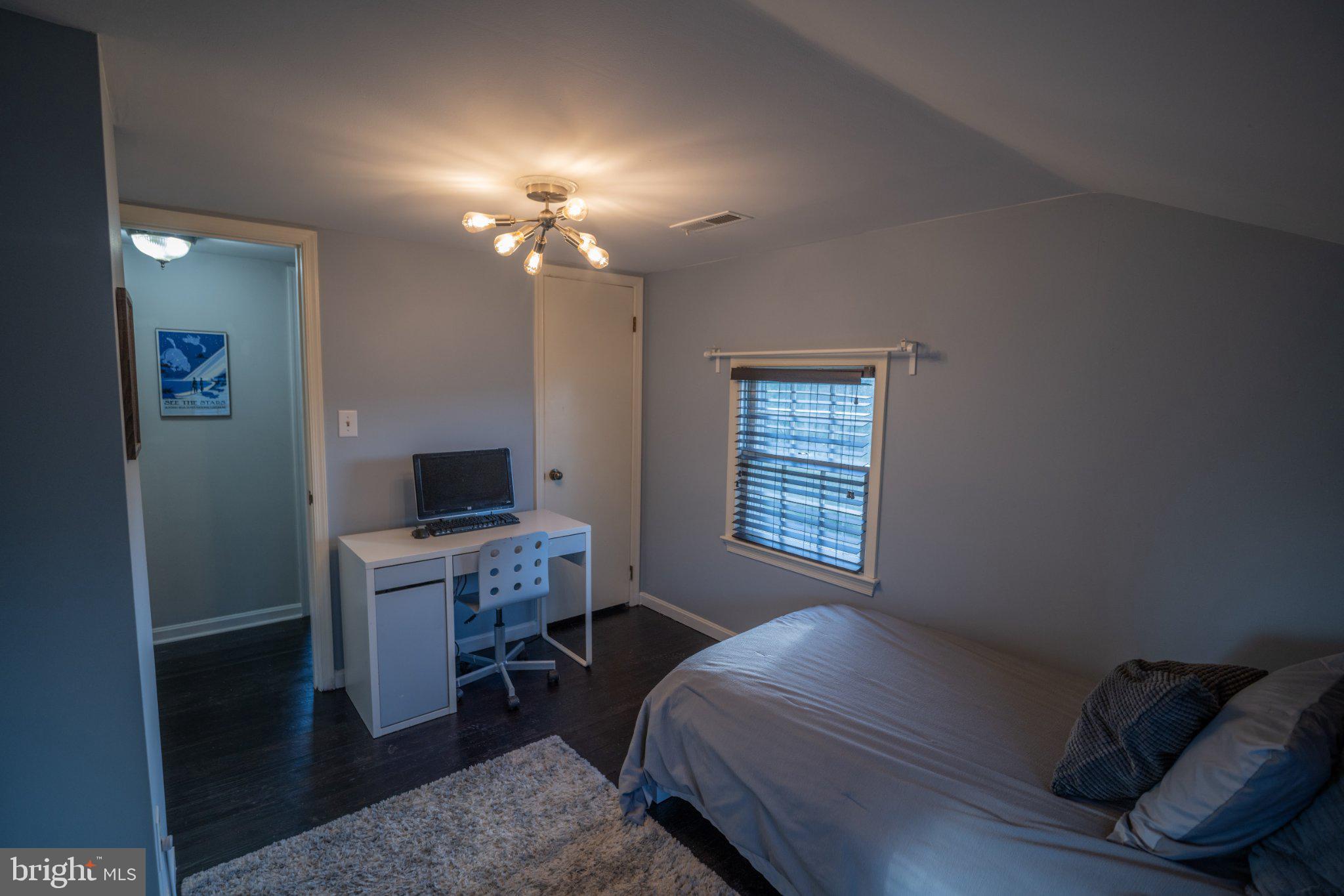 430 Pine Grove Road Bluemont, VA 20135 - Photo 42 of 58 a bedroom with a bed and a window