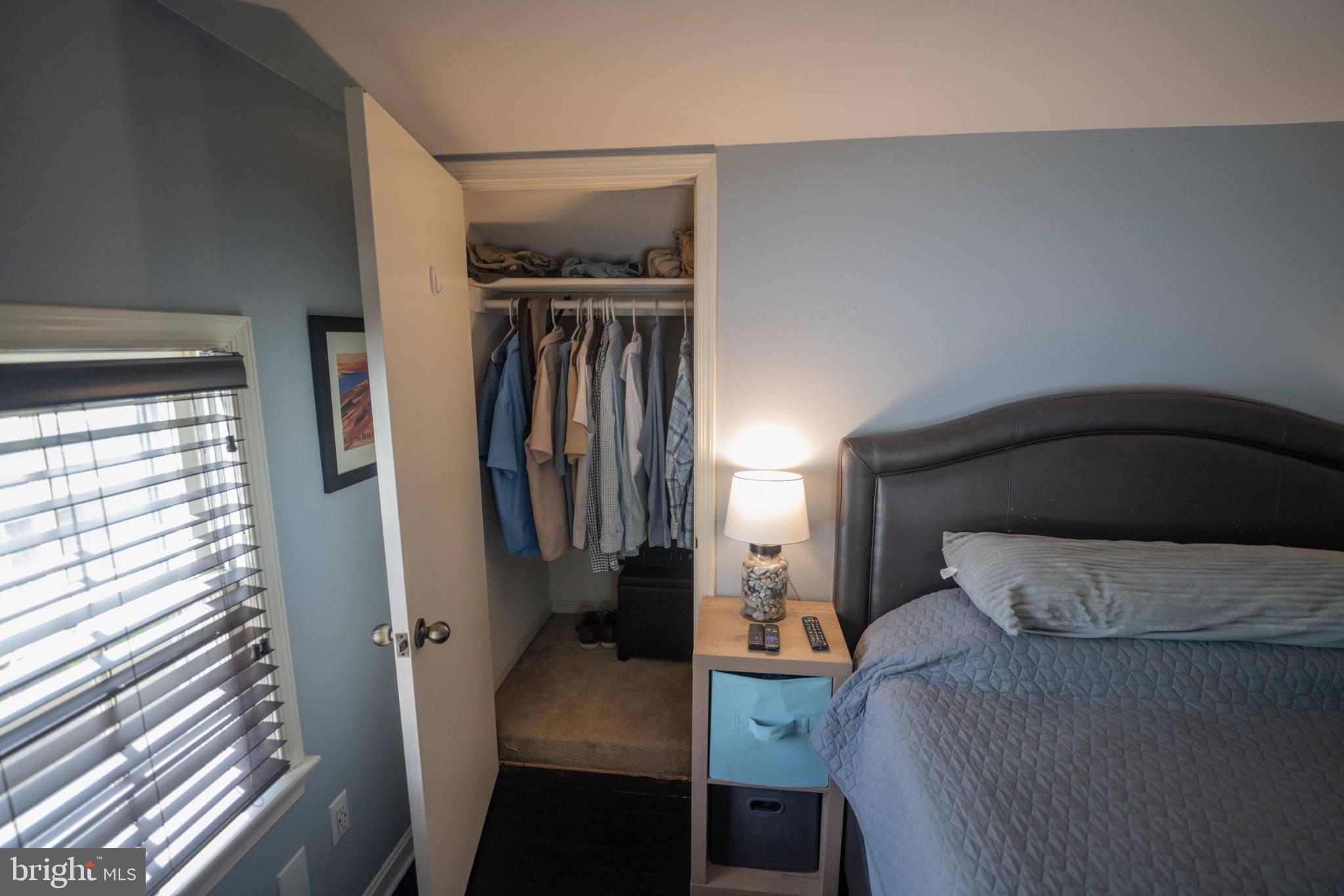 430 Pine Grove Road Bluemont, VA 20135 - Photo 46 of 58 a bedroom with a bed and a mirror