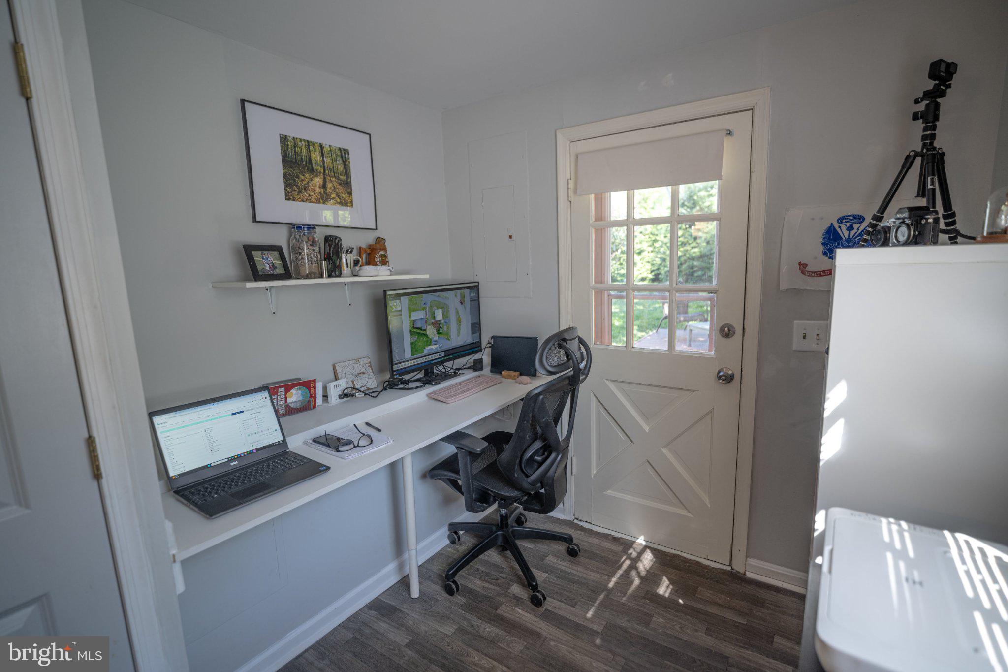 430 Pine Grove Road Bluemont, VA 20135 - Photo 50 of 58 a view of a workspace with furniture and a window