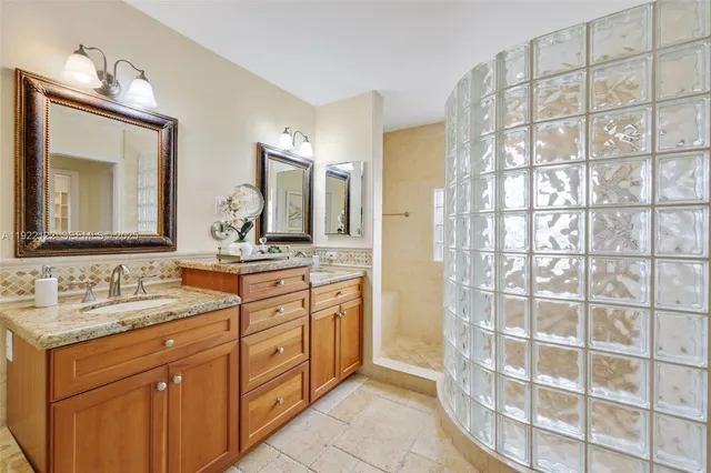 a view of an empty room and wooden floor