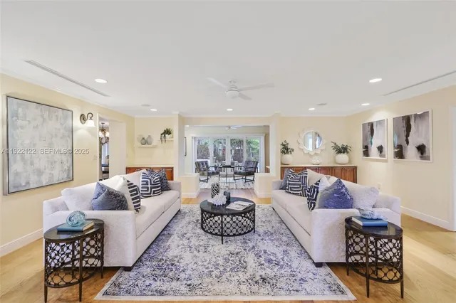a living room with furniture and a rug