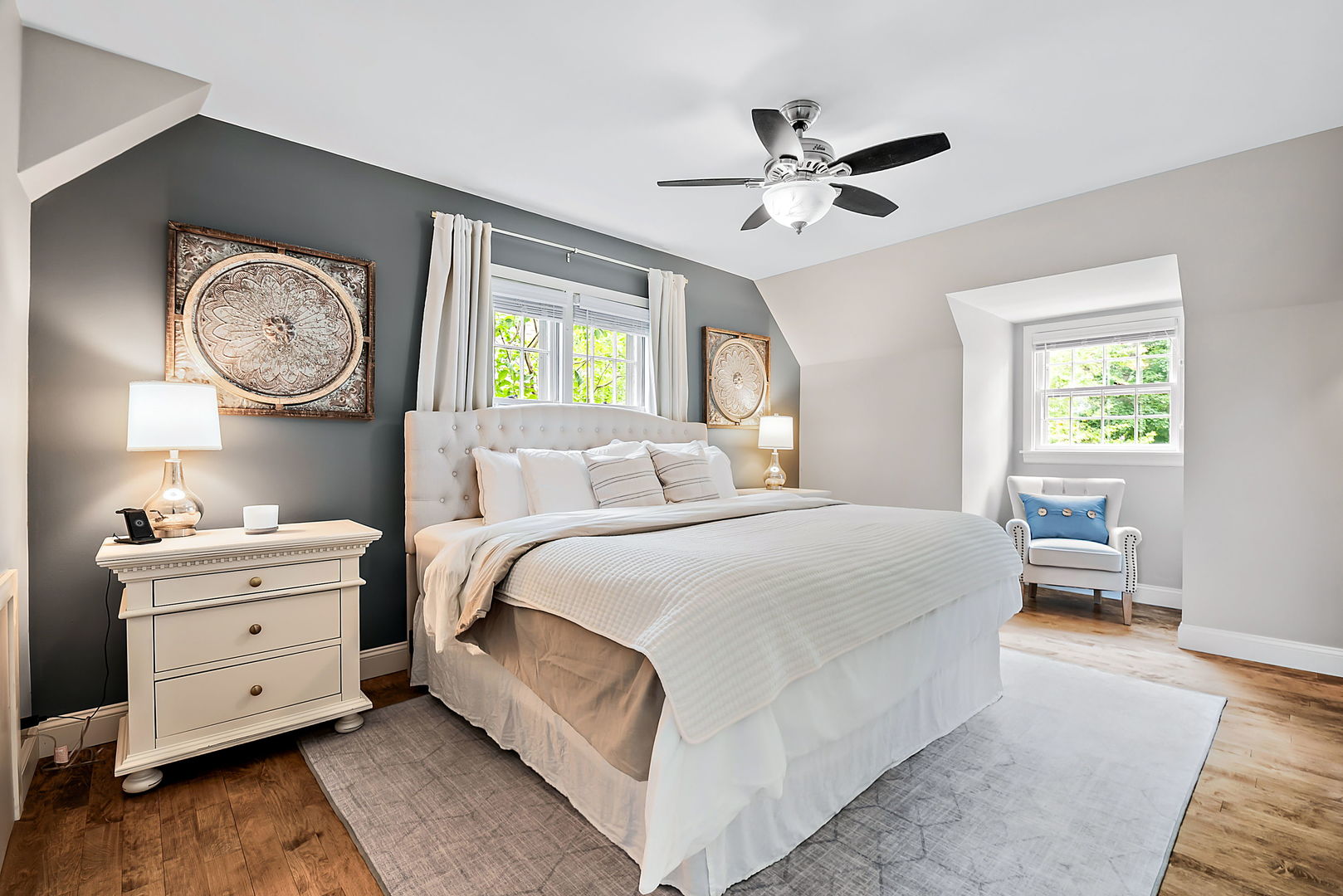 1202 South 4th Street St. Charles, IL 60174 - Photo 12 of 22 a bedroom with a bed and a chandelier