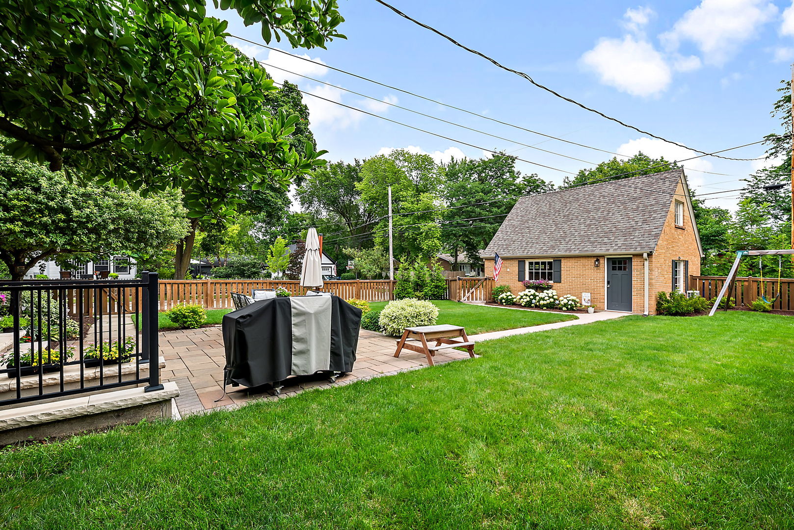 1202 South 4th Street St. Charles, IL 60174 - Photo 18 of 22 a view of a house with backyard and a hammock