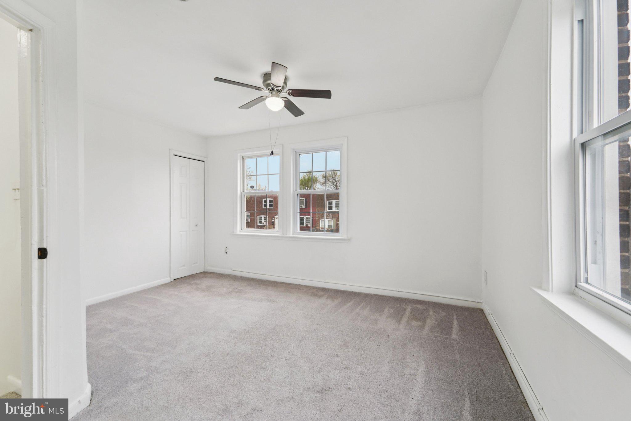 800 Stoll Street Baltimore, MD 21225 - Photo 15 of 24 a view of an empty room with a window