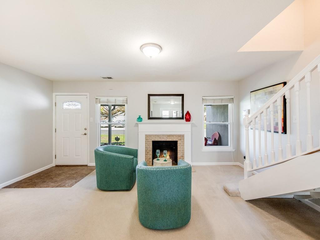 203 Doris Drive Pleasant Hill, CA 94523 - Photo 3 of 22 a living room with furniture and a fireplace