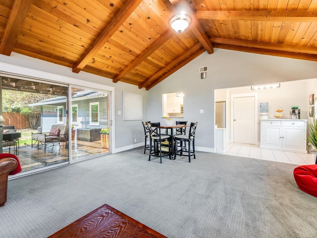 203 Doris Drive Pleasant Hill, CA 94523 - Photo 6 of 22 a dining room with furniture and a floor to ceiling window