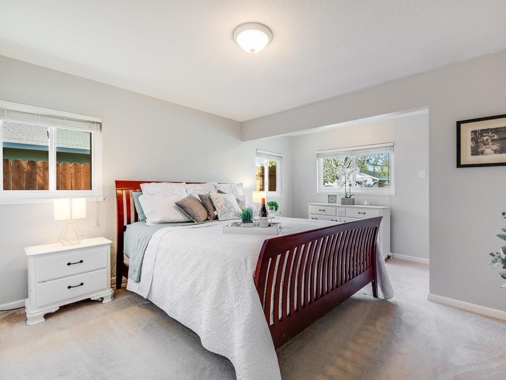 203 Doris Drive Pleasant Hill, CA 94523 - Photo 7 of 22 a bed room with a bed and a window