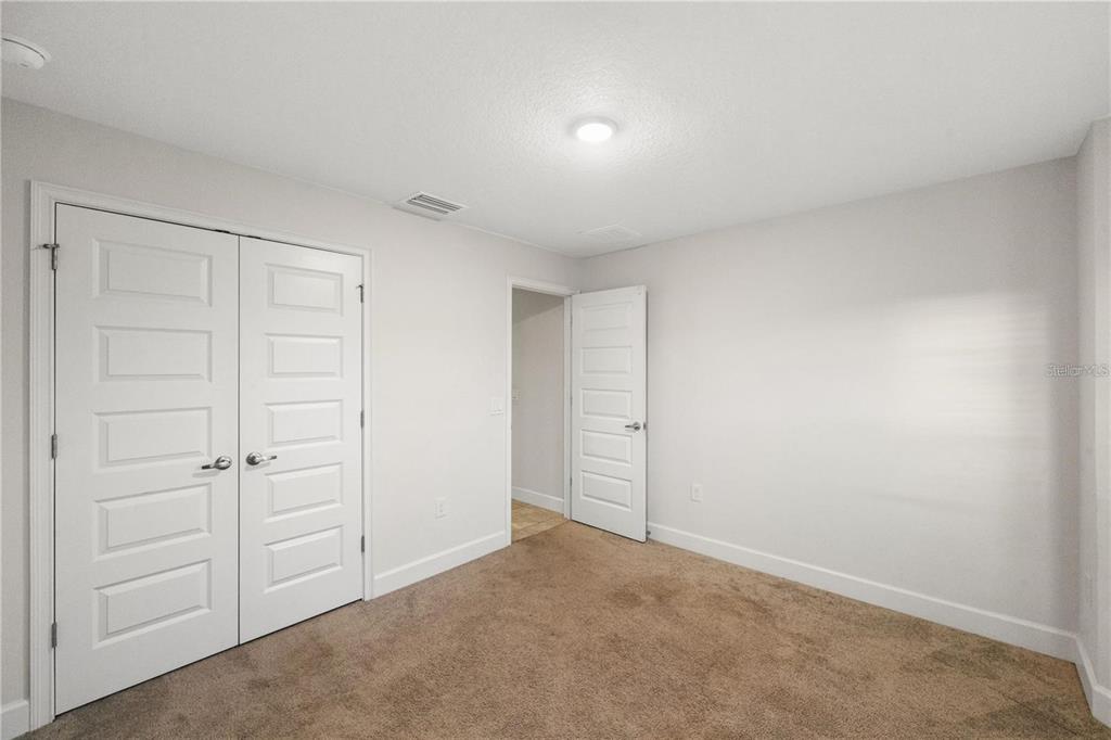 14429 Potterton Circle Hudson, FL 34667 - Photo 18 of 36 a view of an empty room