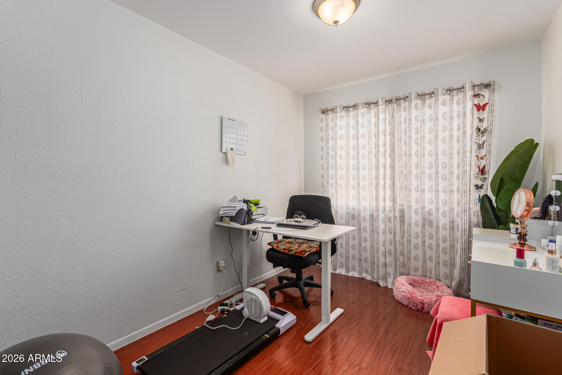 948 South Alma School Road, Unit 128 Mesa, AZ 85210 - Photo 14 of 18 a view of a workspace with furniture and a window