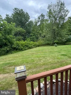 a balcony with a yard