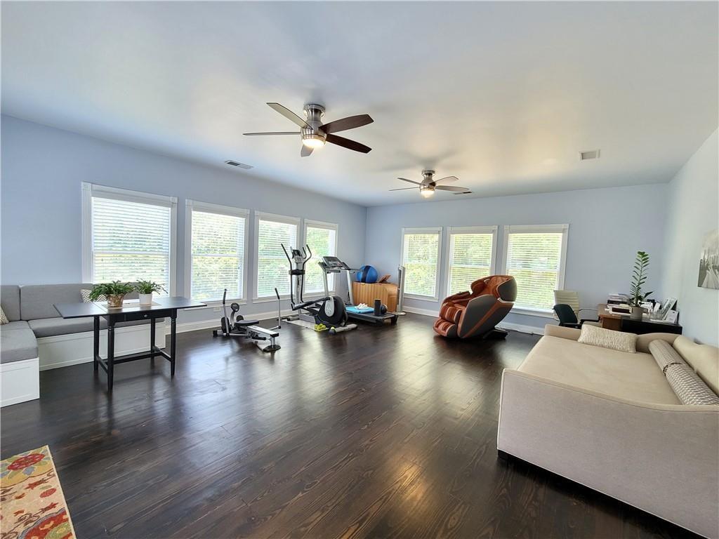 4198 Sardis Church Road Buford, GA 30519 - Photo 3 of 8 a living room with furniture and a large window