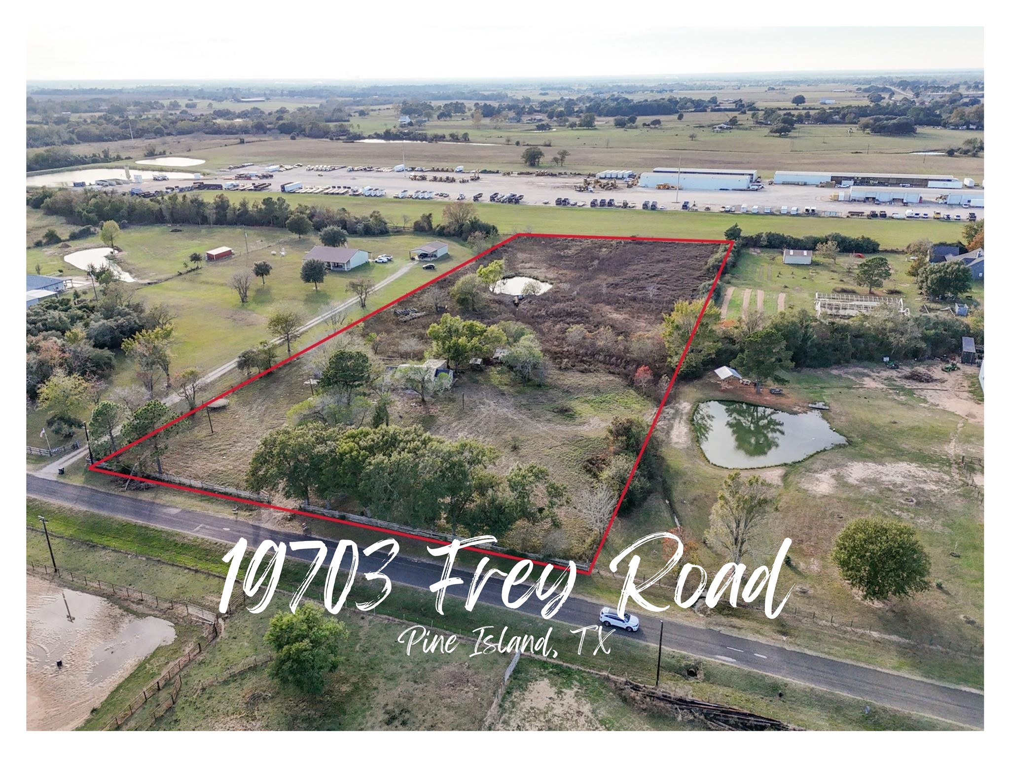 19703 Frey Road Pine Island, TX 77445 - Photo 1 of 18 a view of a lake view