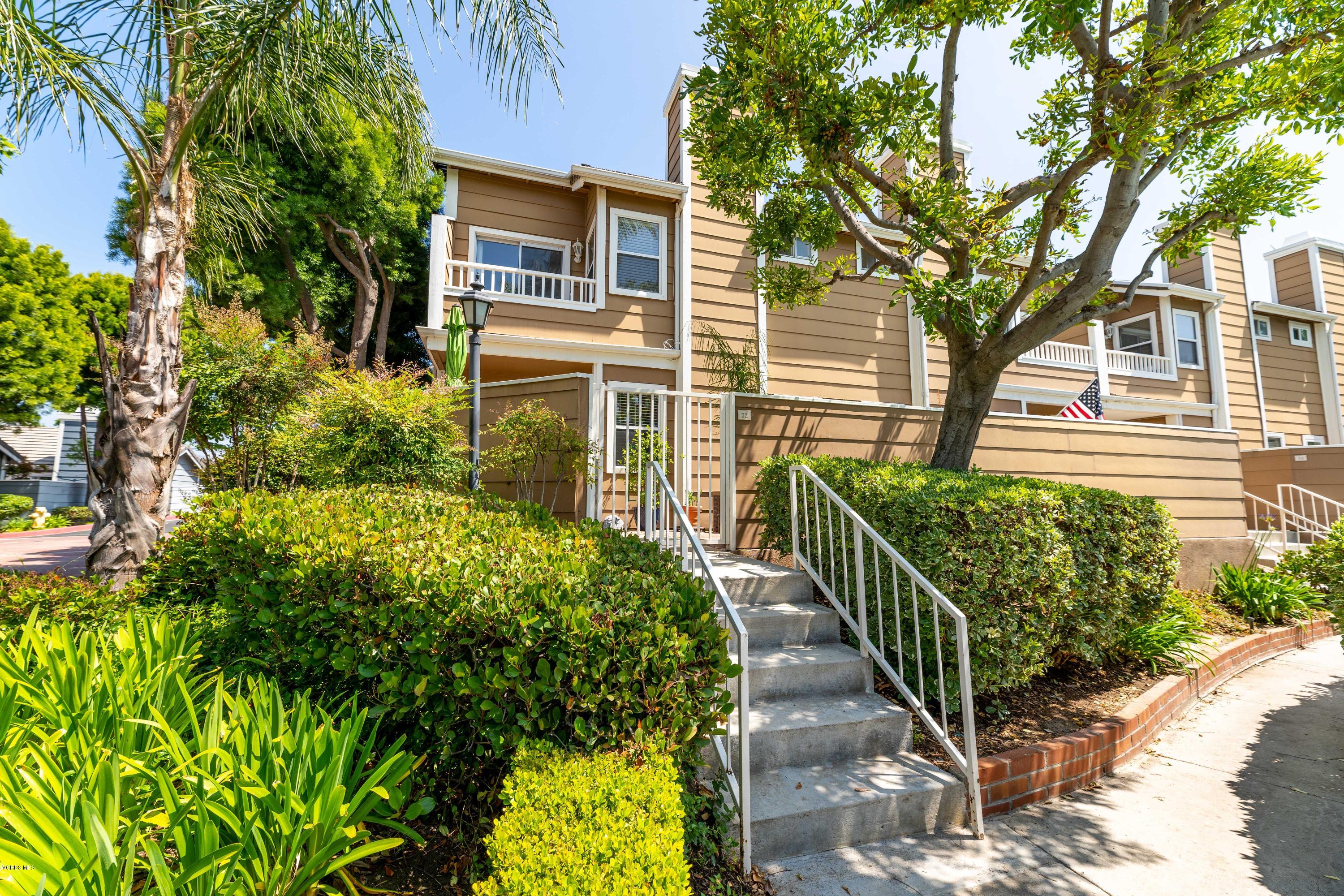 3966 Cochran Street, Unit 72 Simi Valley, CA 93063 - Photo 1 of 26 front view of a house with a yard