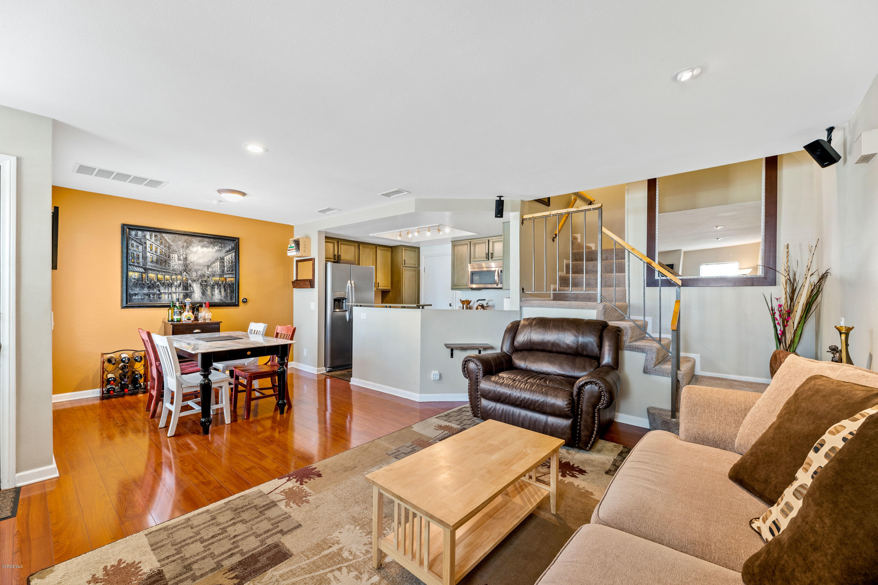 3966 Cochran Street, Unit 72 Simi Valley, CA 93063 - Photo 12 of 26 a living room with furniture and wooden floor
