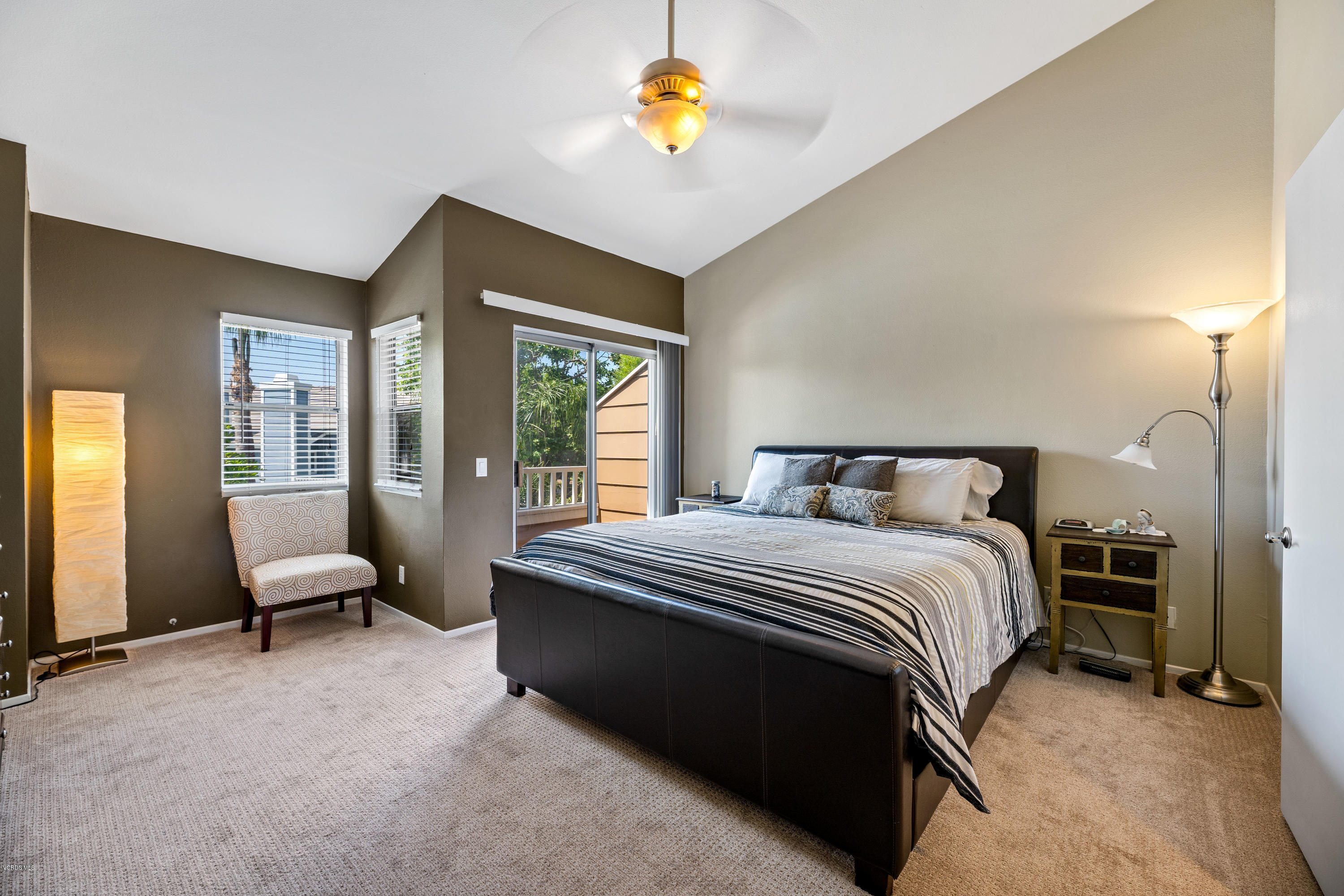 3966 Cochran Street, Unit 72 Simi Valley, CA 93063 - Photo 14 of 26 a bedroom with a bed and a couch