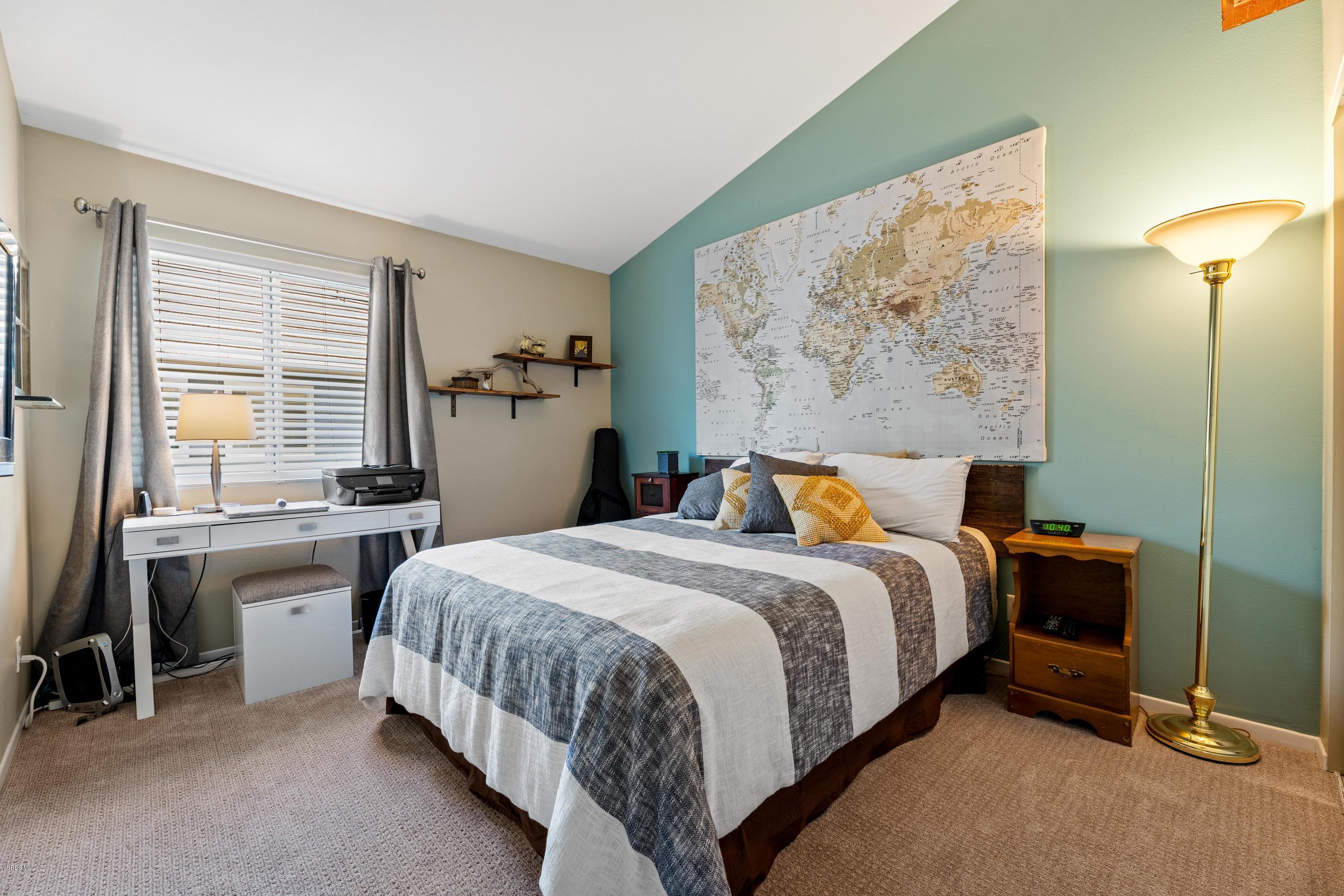 3966 Cochran Street, Unit 72 Simi Valley, CA 93063 - Photo 20 of 26 a bedroom with a bed and a desk