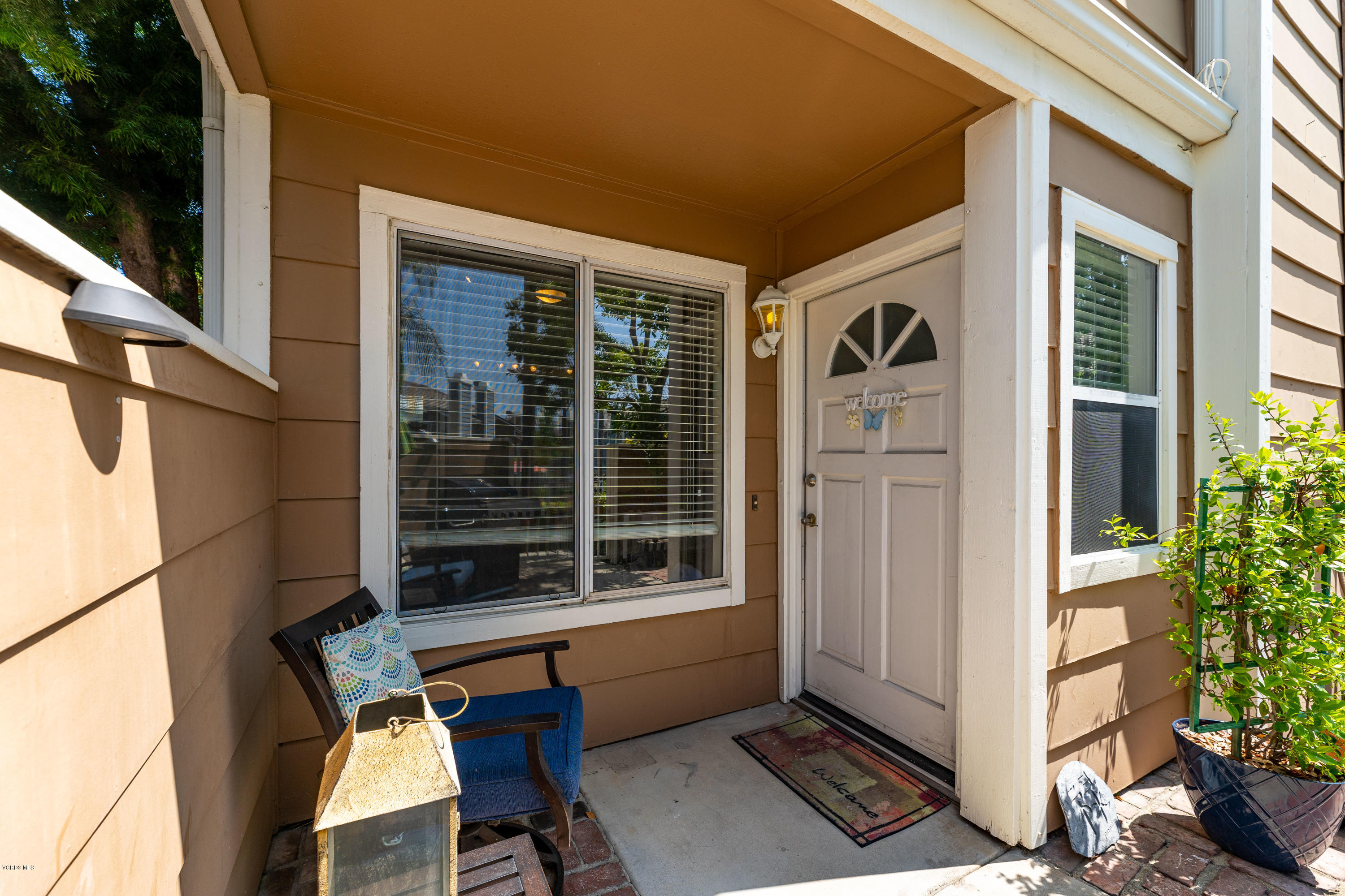 3966 Cochran Street, Unit 72 Simi Valley, CA 93063 - Photo 21 of 26 a front view of a house with a large window