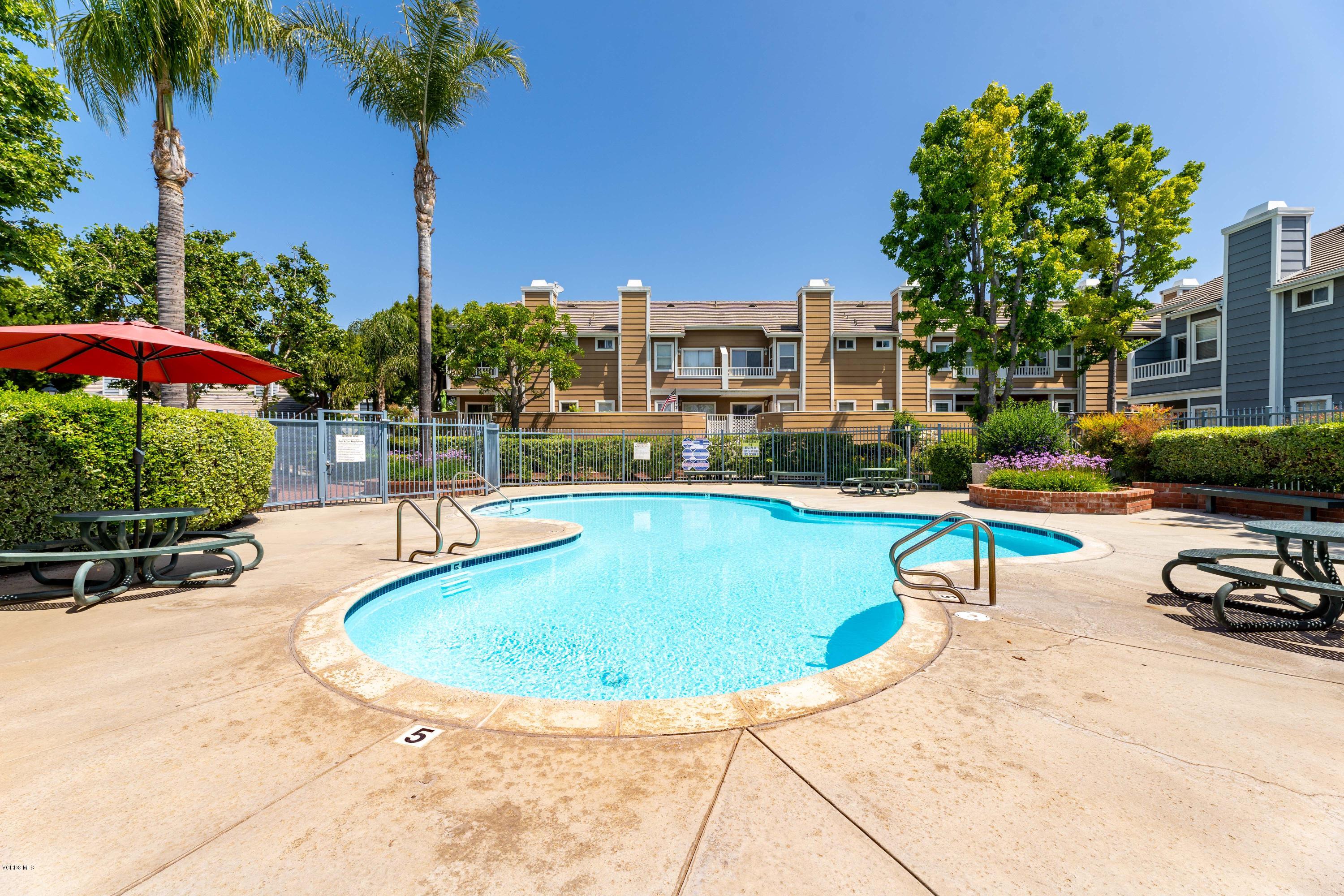 3966 Cochran Street, Unit 72 Simi Valley, CA 93063 - Photo 24 of 26 a view of a swimming pool with a patio