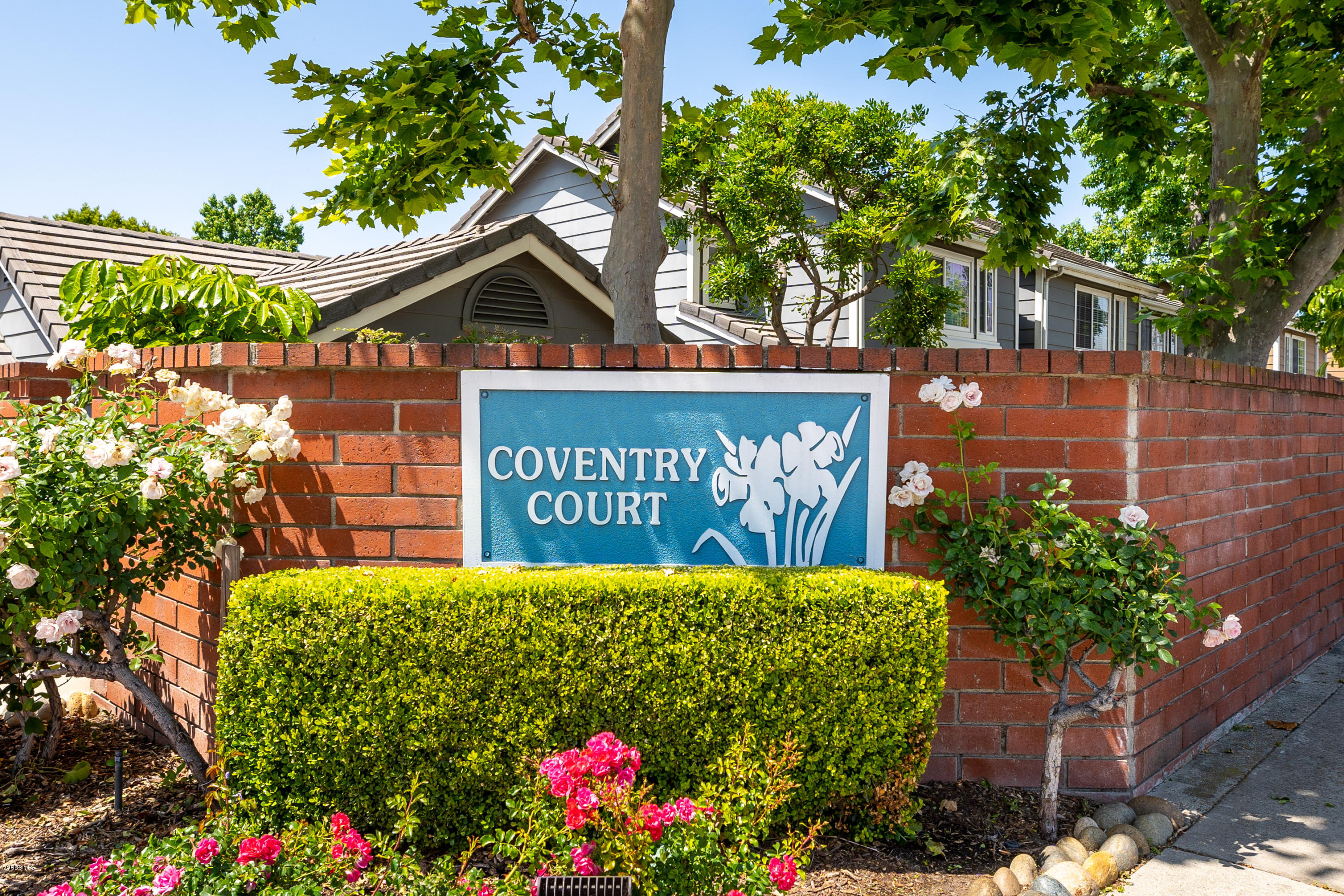 3966 Cochran Street, Unit 72 Simi Valley, CA 93063 - Photo 26 of 26 a view of a sign board with buildings in the background