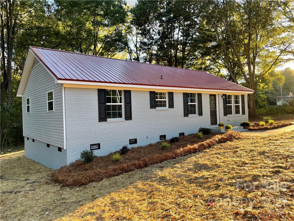 1601 Rushing Street Monroe, NC 28112 - Photo 2 of 21 a view of a house with a backyard