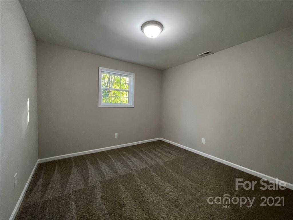 1601 Rushing Street Monroe, NC 28112 - Photo 11 of 21 an empty room with windows
