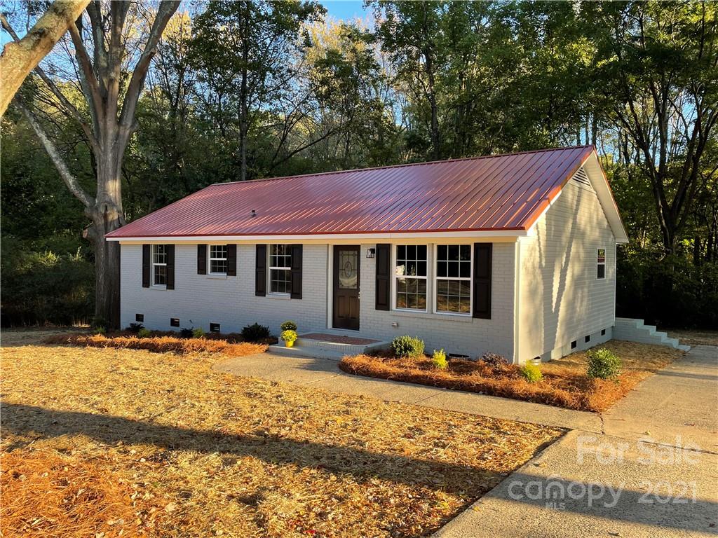 1601 Rushing Street Monroe, NC 28112 - Photo 5 of 21 a front view of a house with a yard