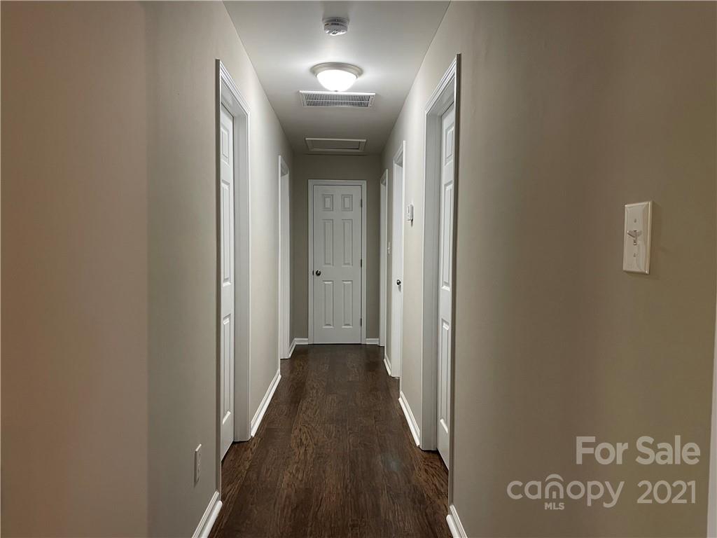 1601 Rushing Street Monroe, NC 28112 - Photo 10 of 21 a view of a hallway with wooden floor